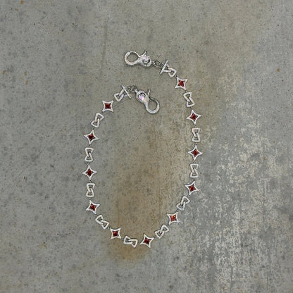 Known Menace "Red Rupture" Wallet Chain - Garnet Series - Pluto 5ive LLC T-Shirt